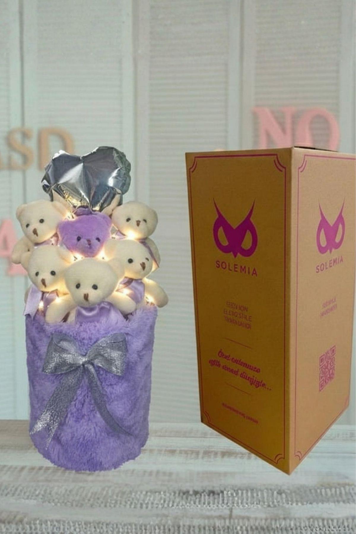 Kadınlar Gününe ÖZEL: Deluxe Lila Peluş Silindir Kutuda, LED Işıklı Kalpli Balonlu 6’lı Lila Ayıcık Buketi - Sevdiğine Hediye