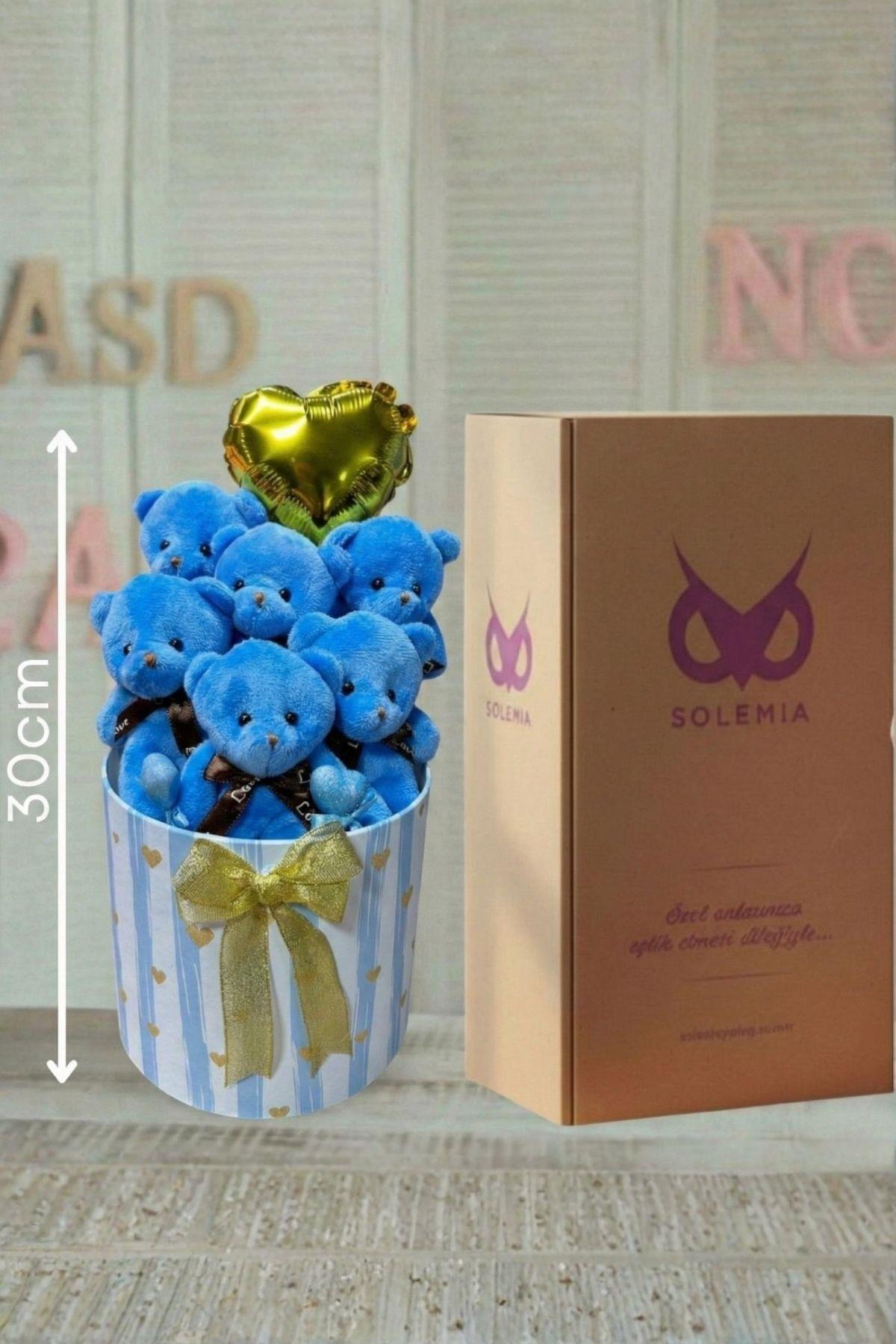 Kadınlar Gününe ÖZEL: Gold Detaylı Premium Silindir Kutuda, Kalpli Balonlu 6’lı Mavi Ayıcık Buketi